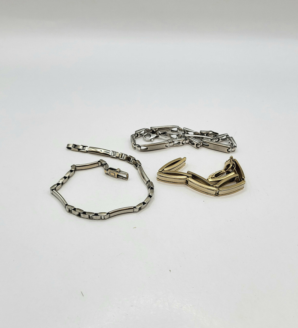 Tre bracciali oro