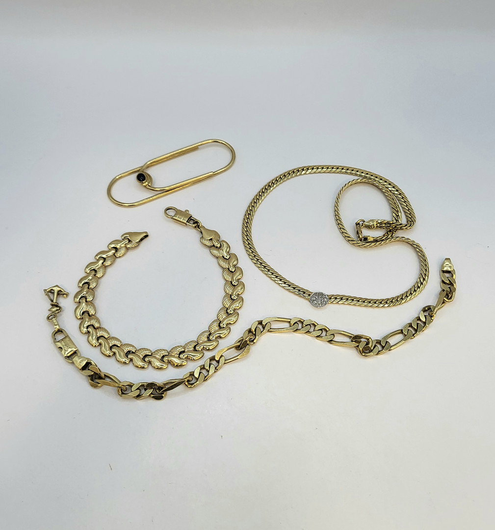 Vari oggetti oro pietra diamantini