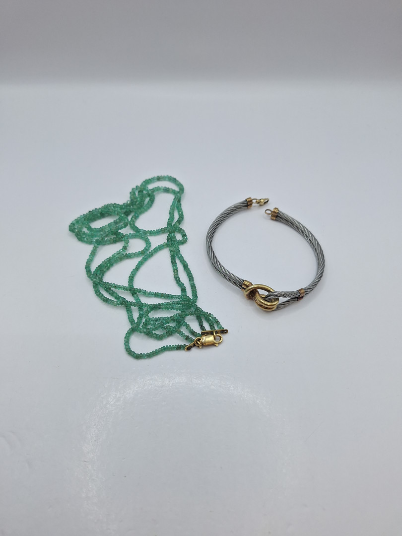 Collana e bracciale oro pietre acciaio