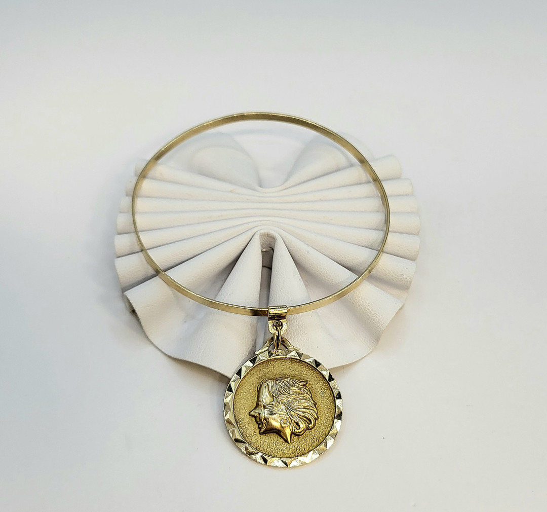 Bracciale e ciondolo oro