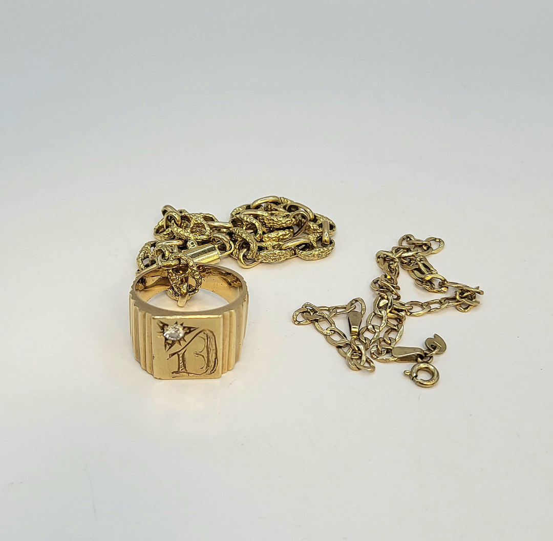 Due bracciali e anello oro diamante
