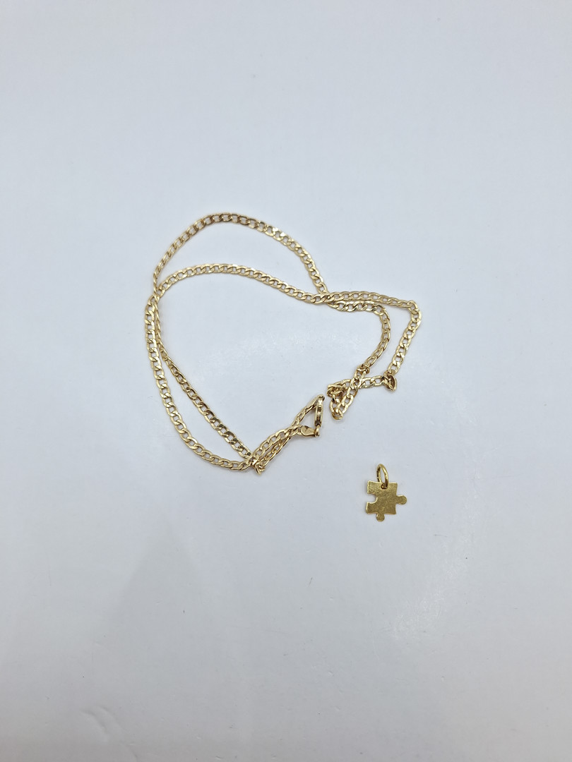 Ciondolo e collana in oro 