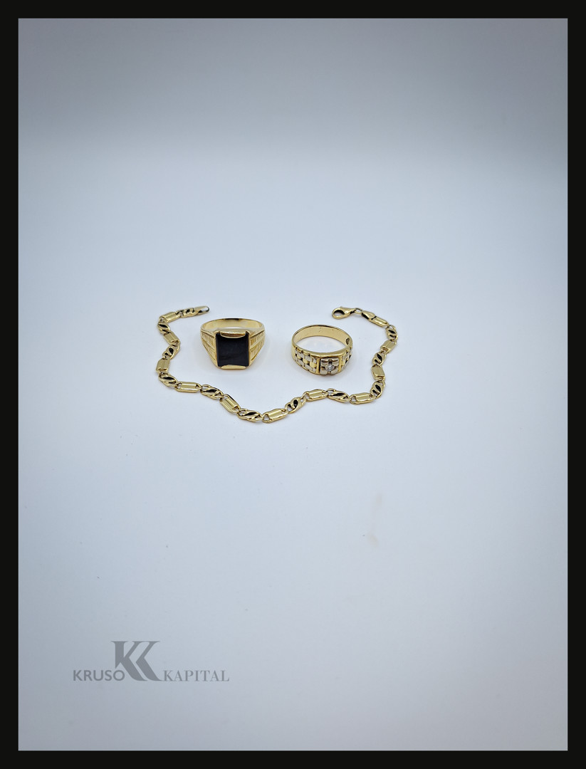 Due anelli e bracciale oro pietra diamante
