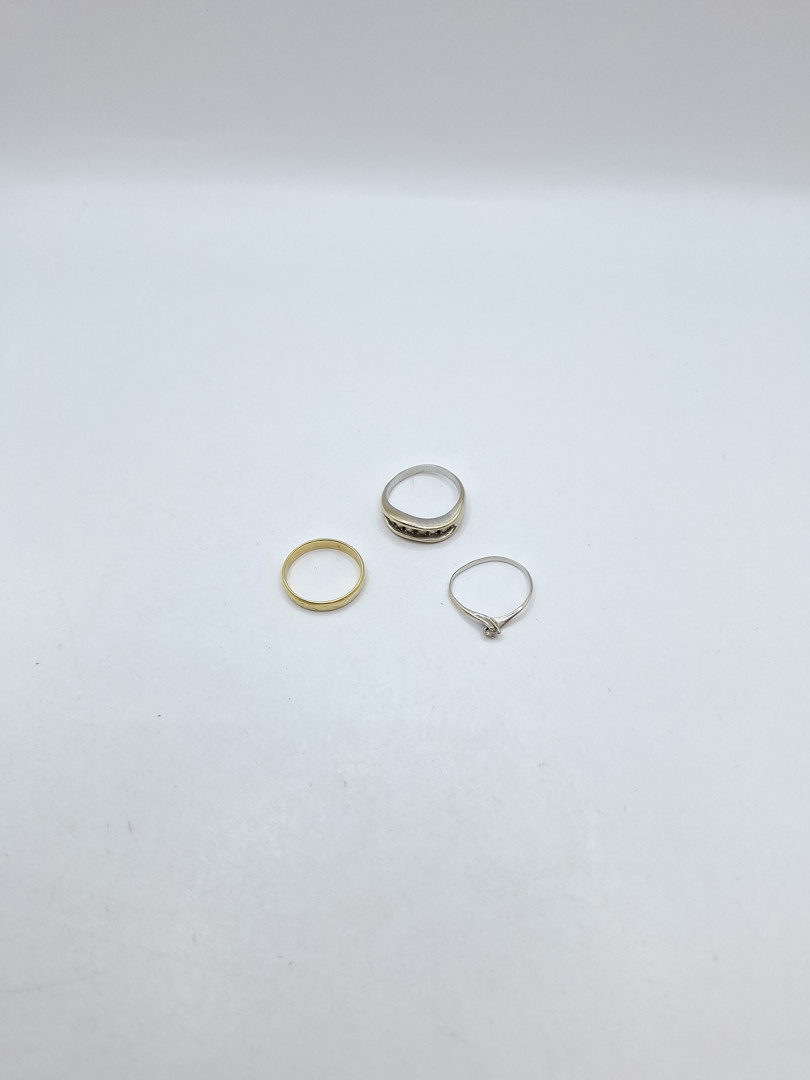Tre anelli oro diamantini