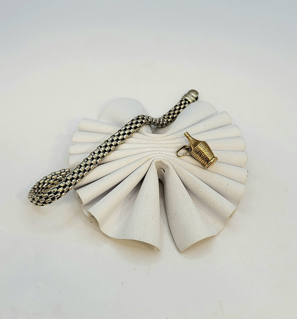 Bracciale e ciondolo oro