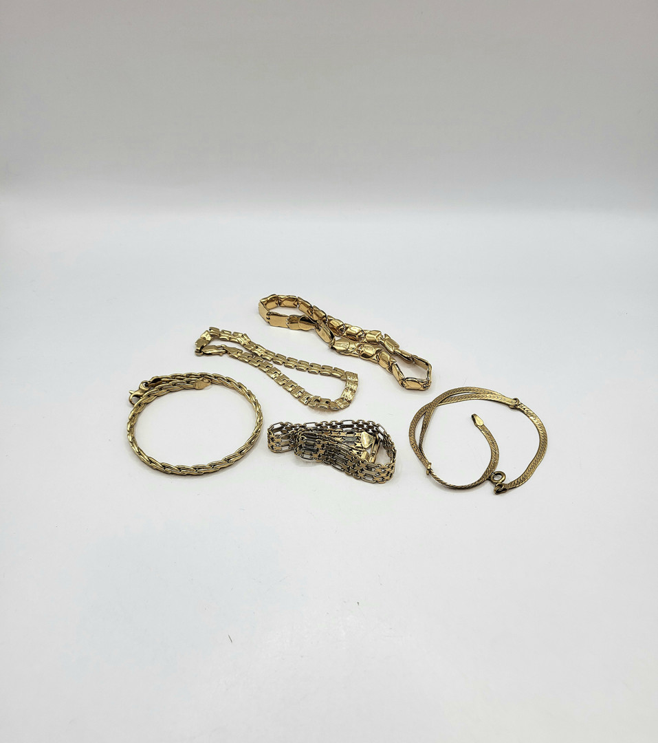 Cinque bracciali oro