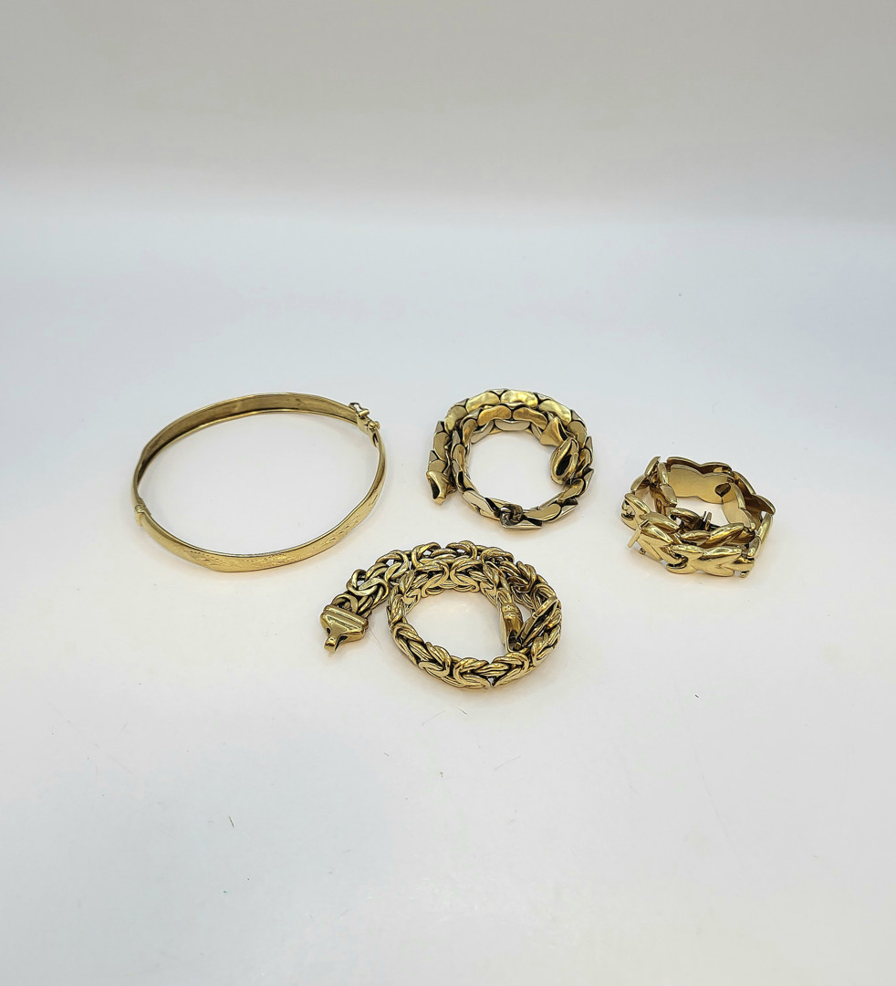 Quattro bracciali oro