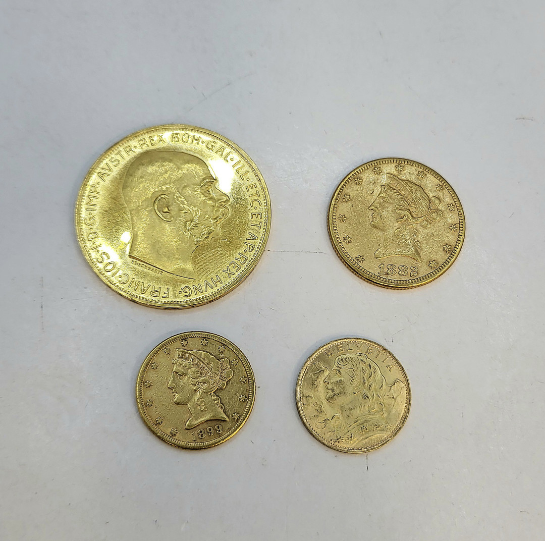 Quattro monete oro
