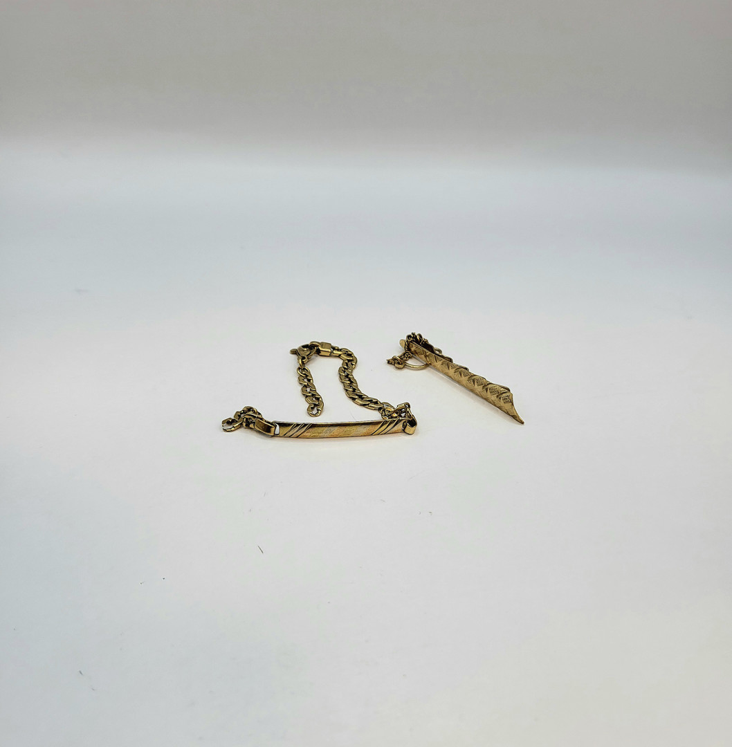 Bracciale e fermacravatta oro