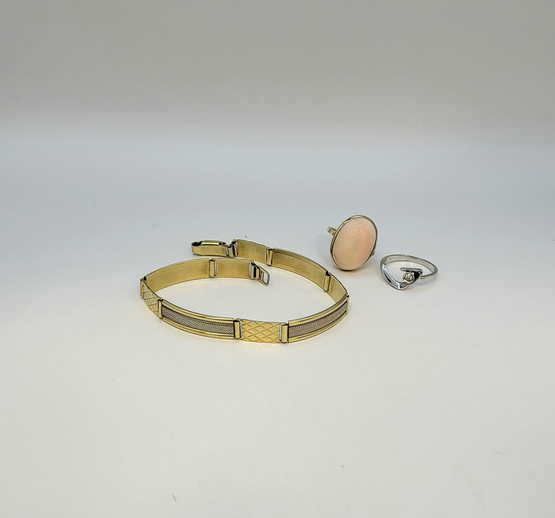 Due anelli e bracciale oro pietra diamantino