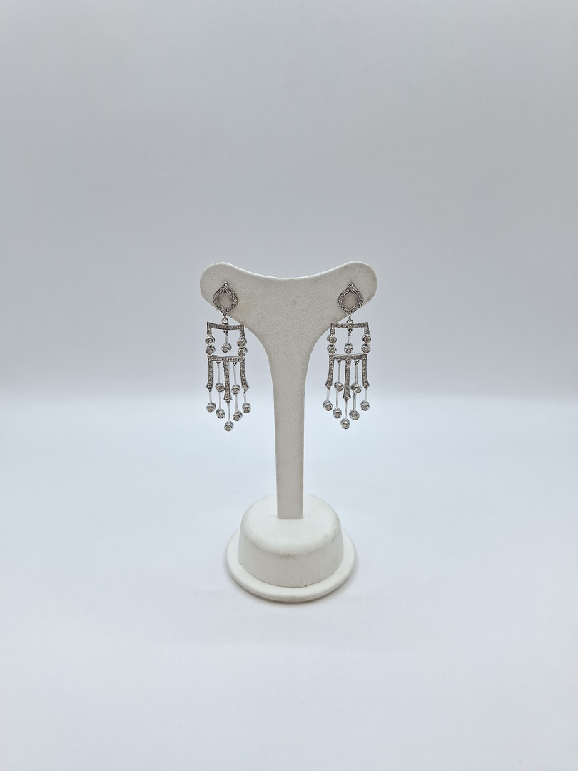 Paio orecchini oro diamantini