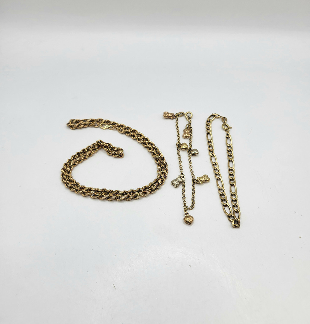 Collana e due bracciali oro