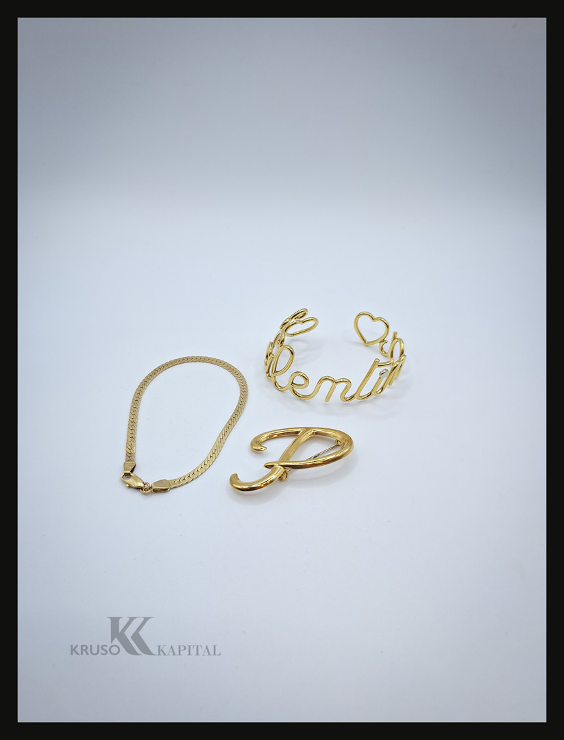 Due bracciali spilla oro