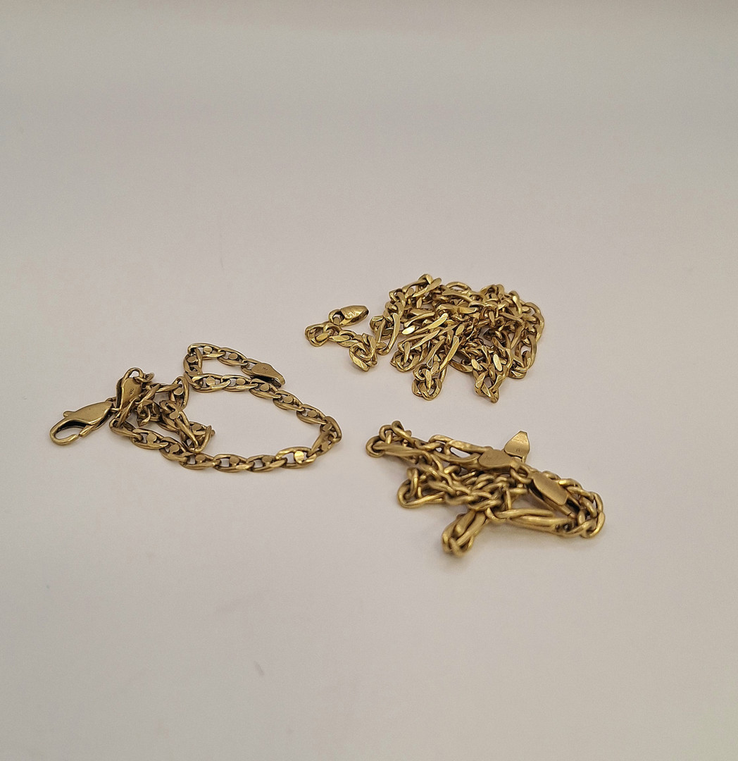 Due bracciali e collana oro 