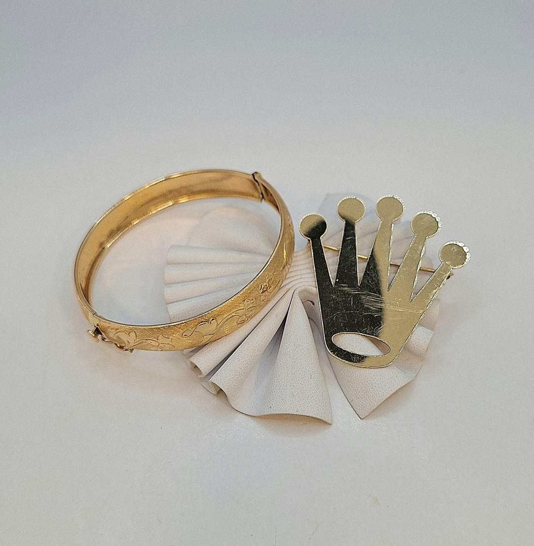 Bracciale e spilla oro