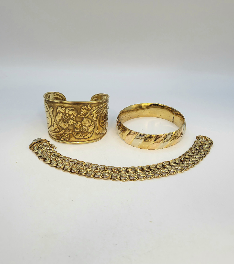 Tre bracciali oro