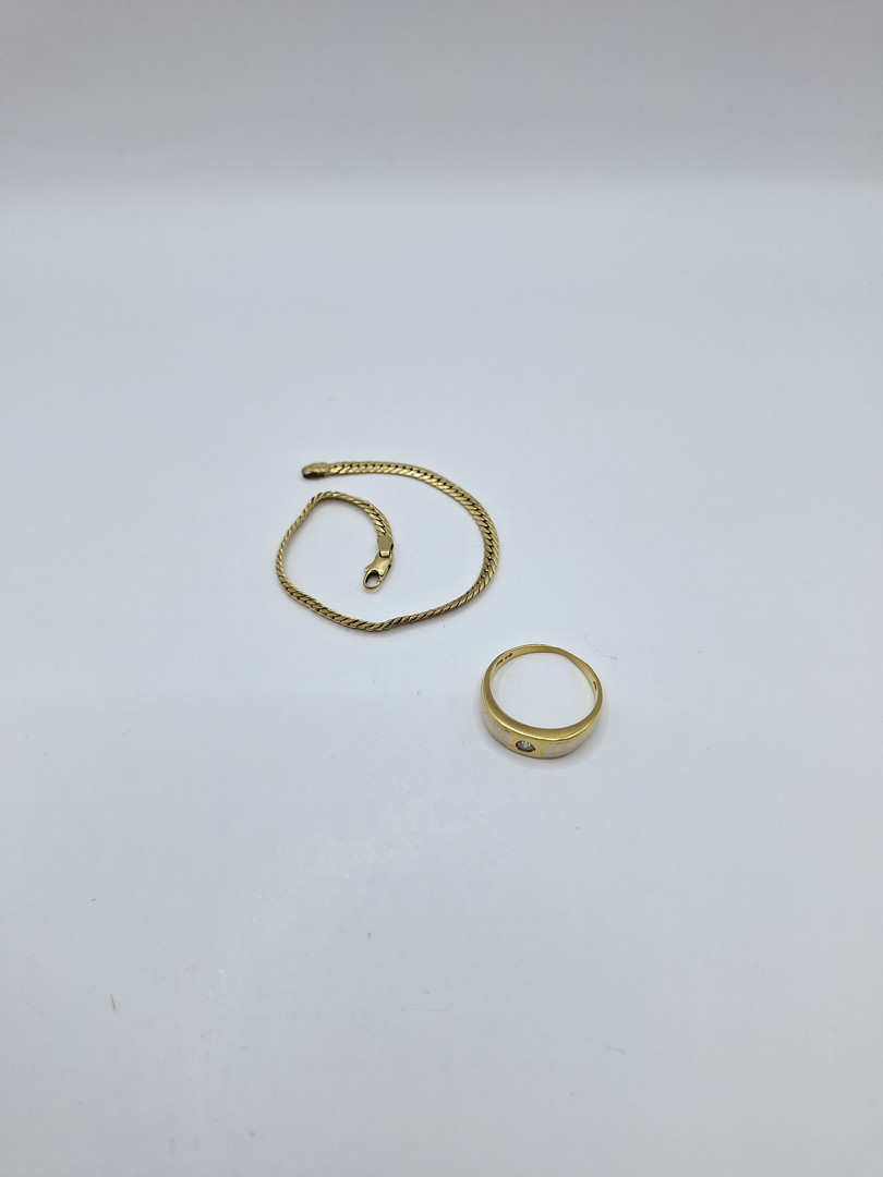 Bracciale e anello oro pietra