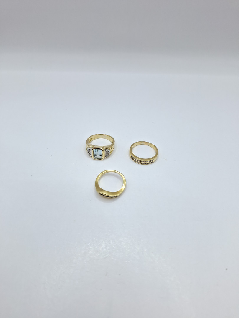 Tre anelli oro pietre diamantini