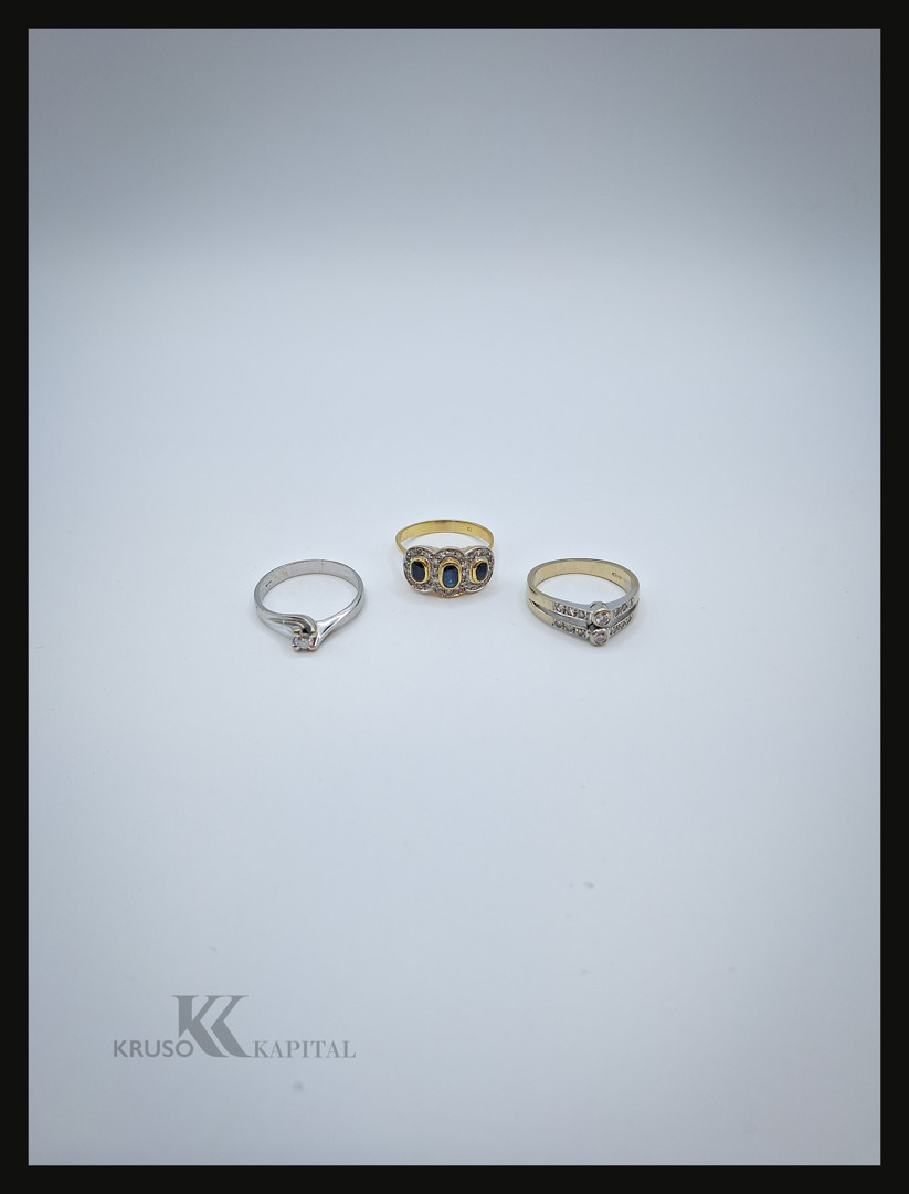 Tre anelli oro pietre diamanti