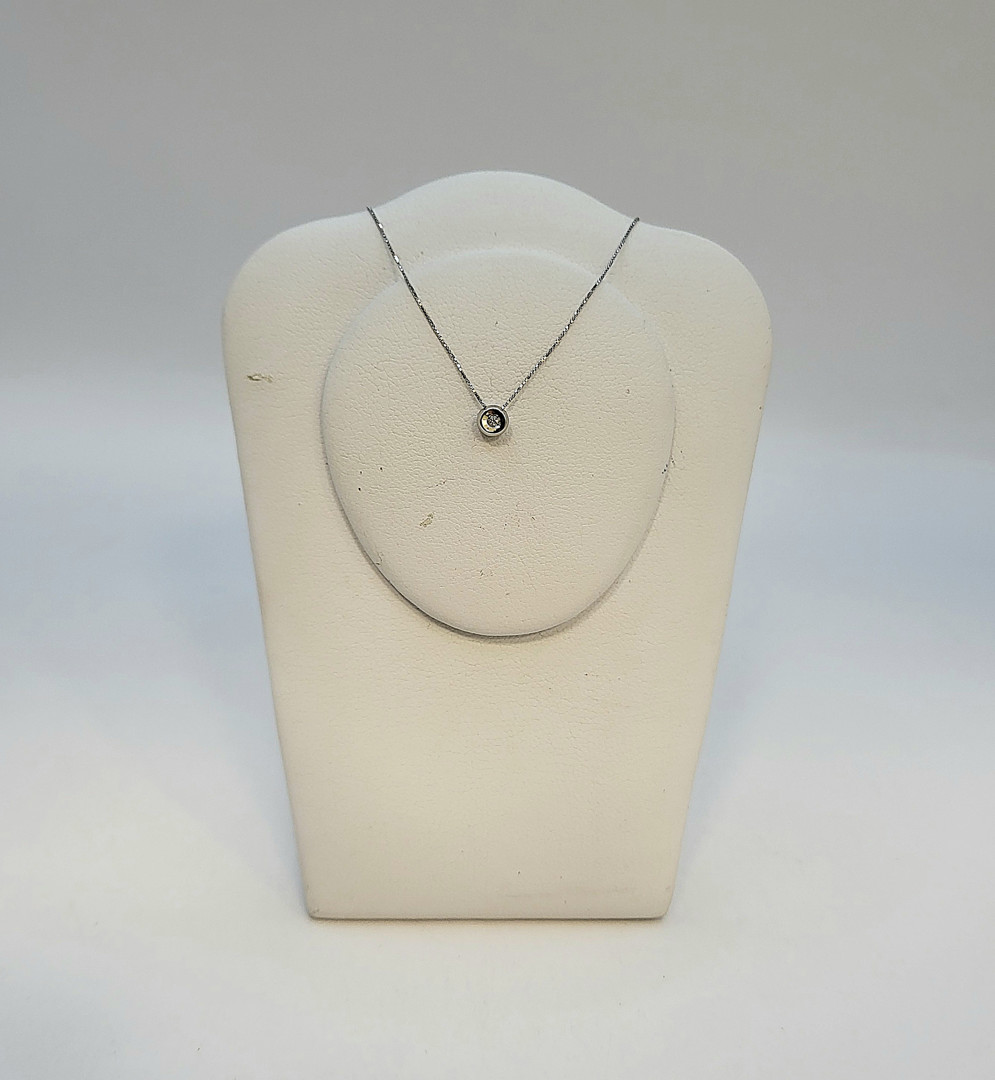 Catenina e ciondolo oro diamantino