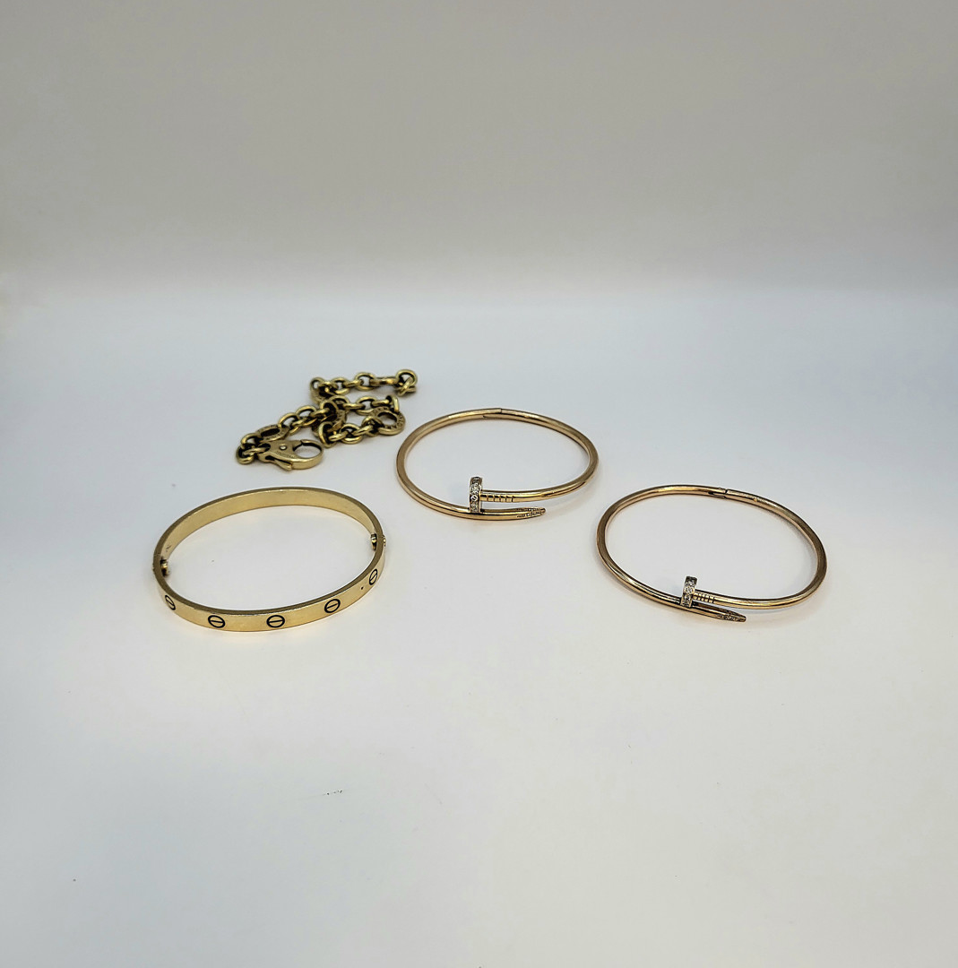 Quattro bracciali oro diamanti