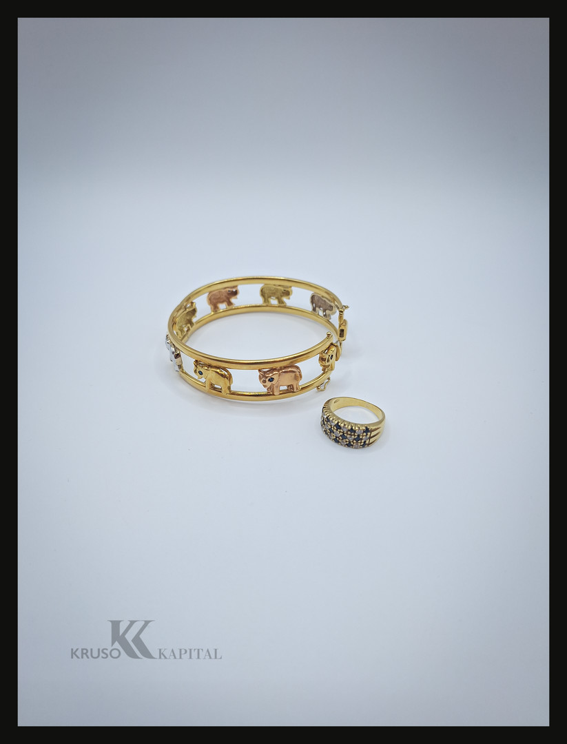 Bracciale e anello oro pietre