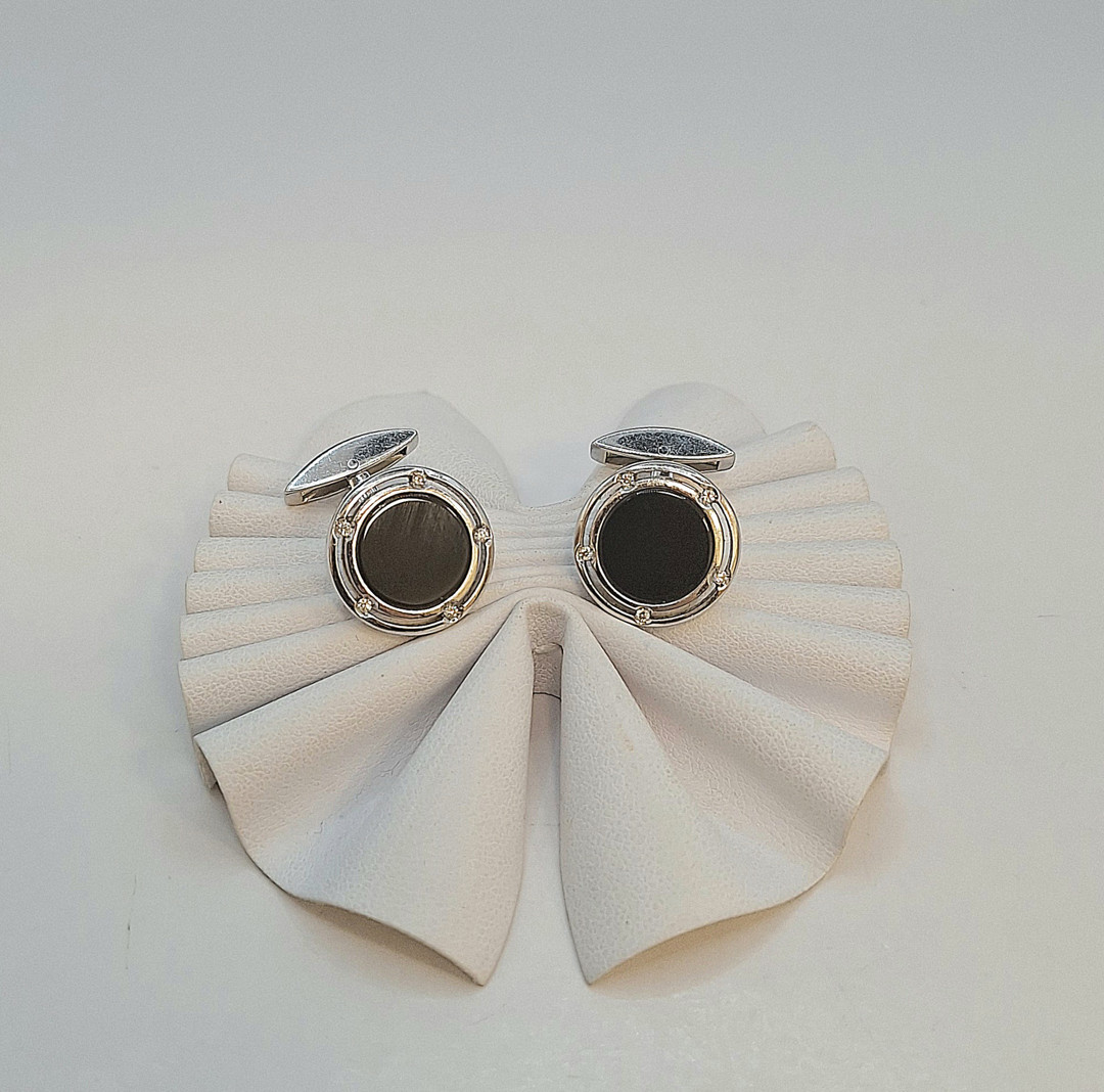 Due gemelli oro pietre diamantini