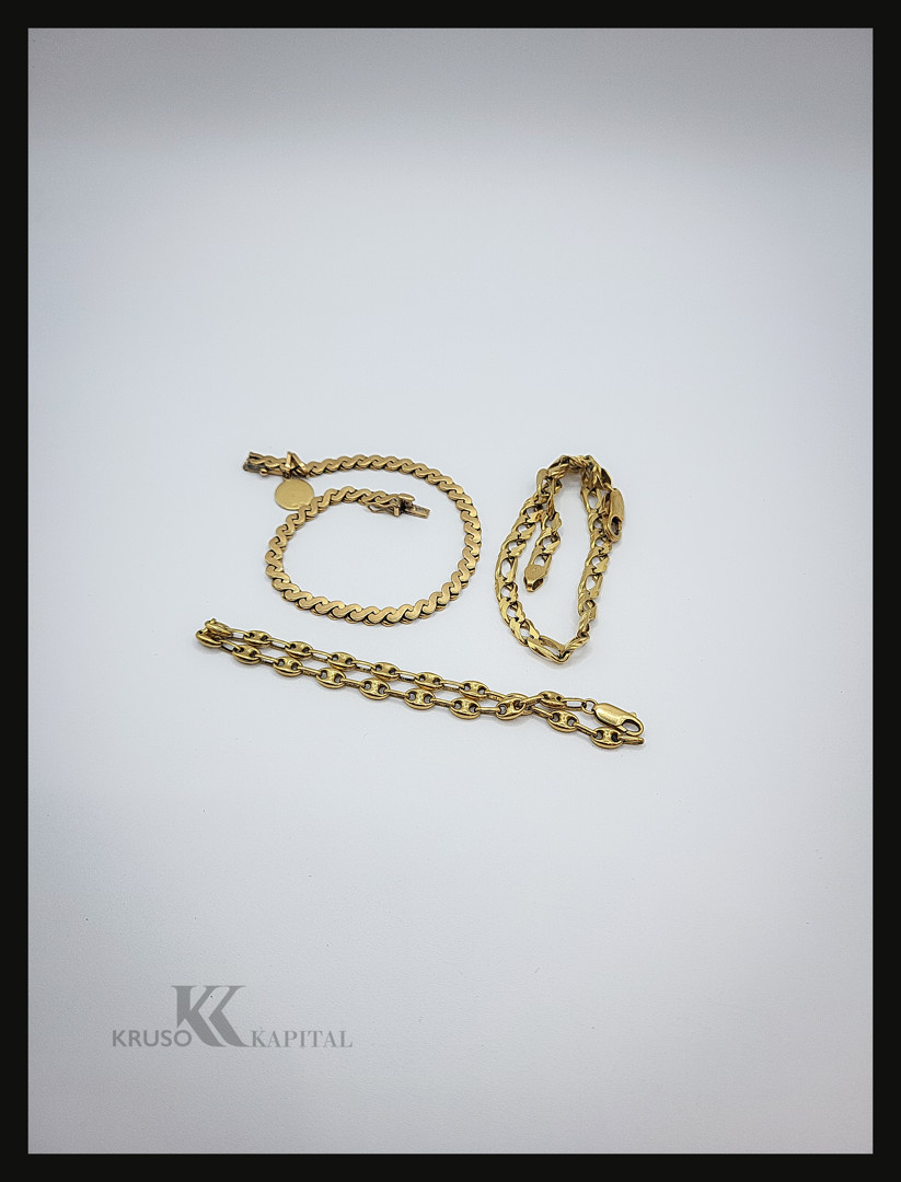 Tre bracciali e ciondolo oro 