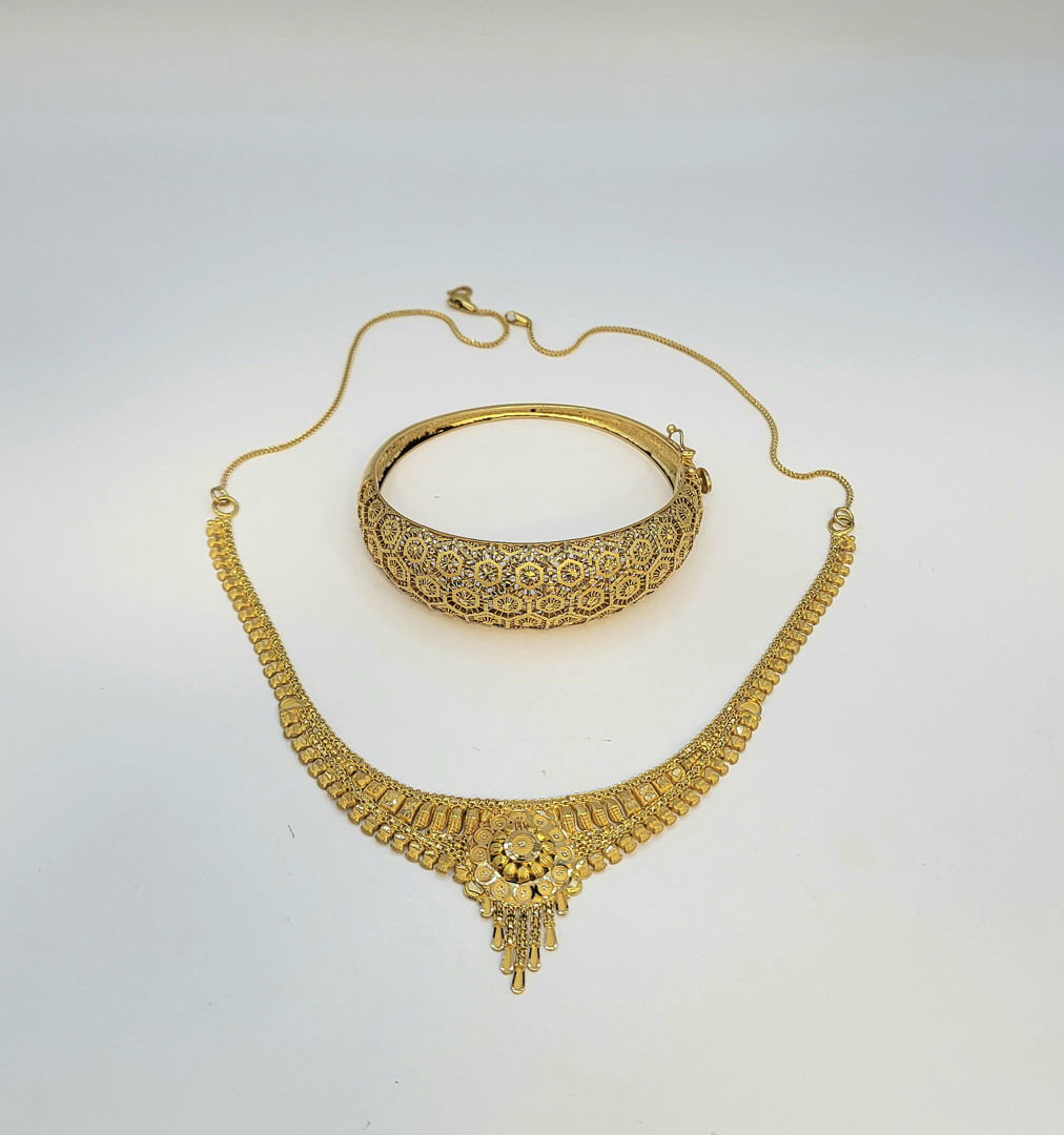Collana e bracciale oro