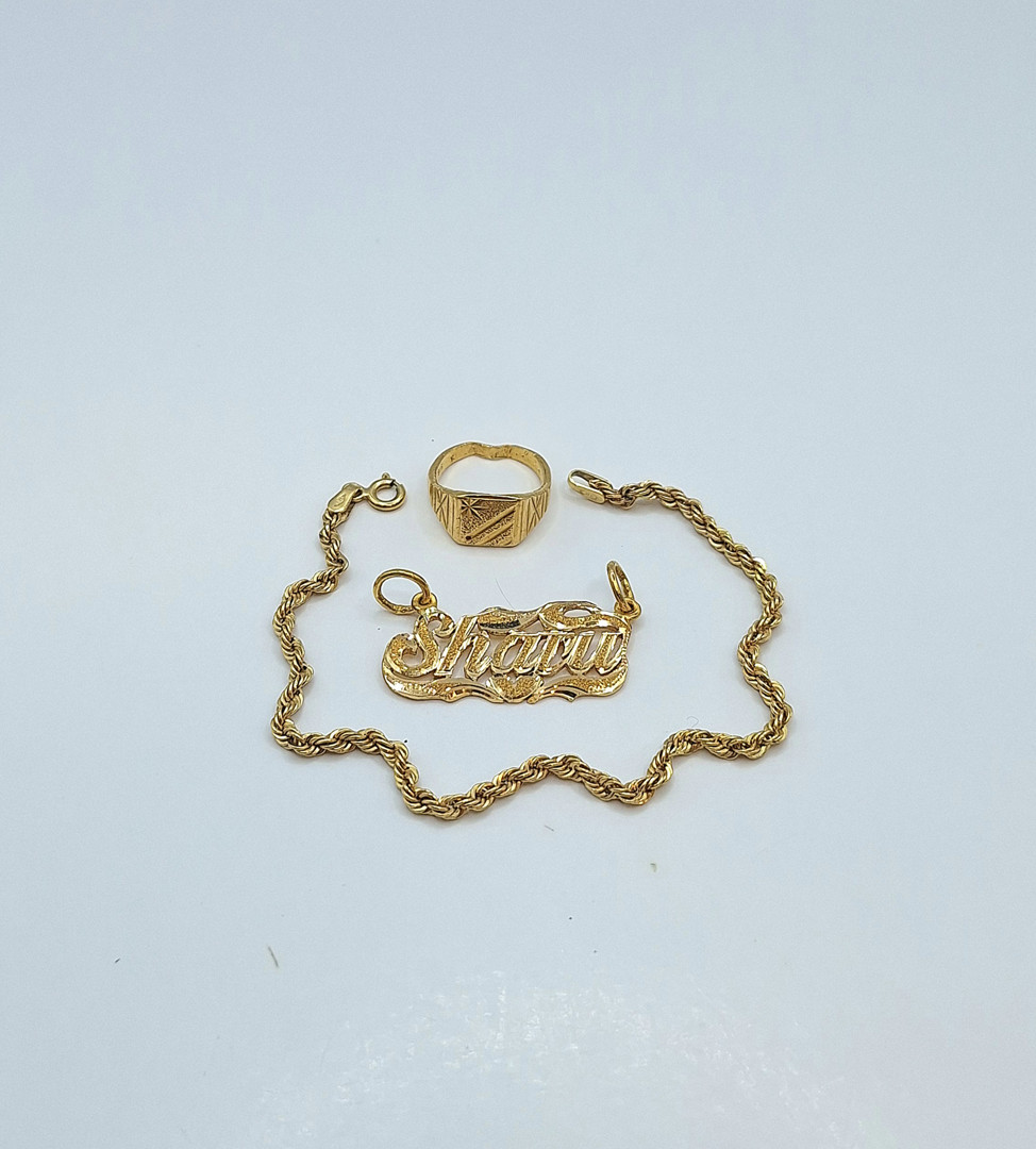 Anello ciondolo e bracciale oro 