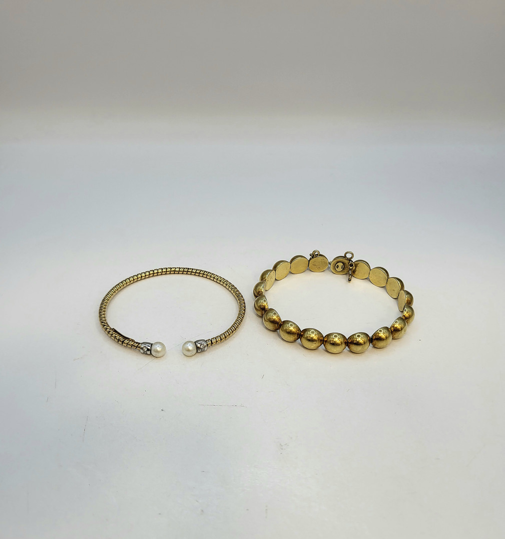 Due bracciali oro metallo diamanti madreperla