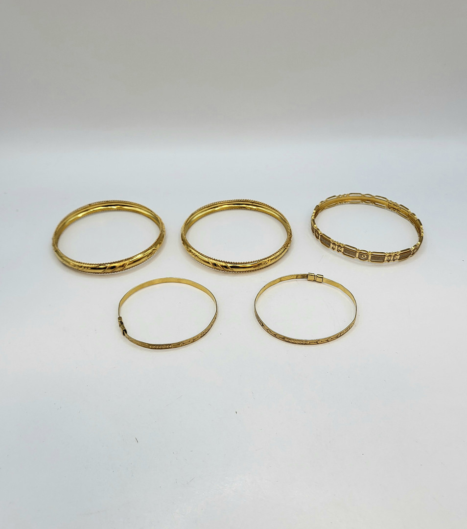 Cinque bracciali oro