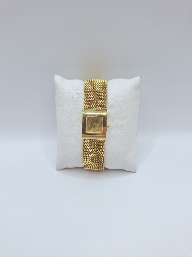 Orologio Tissot con bracciale oro