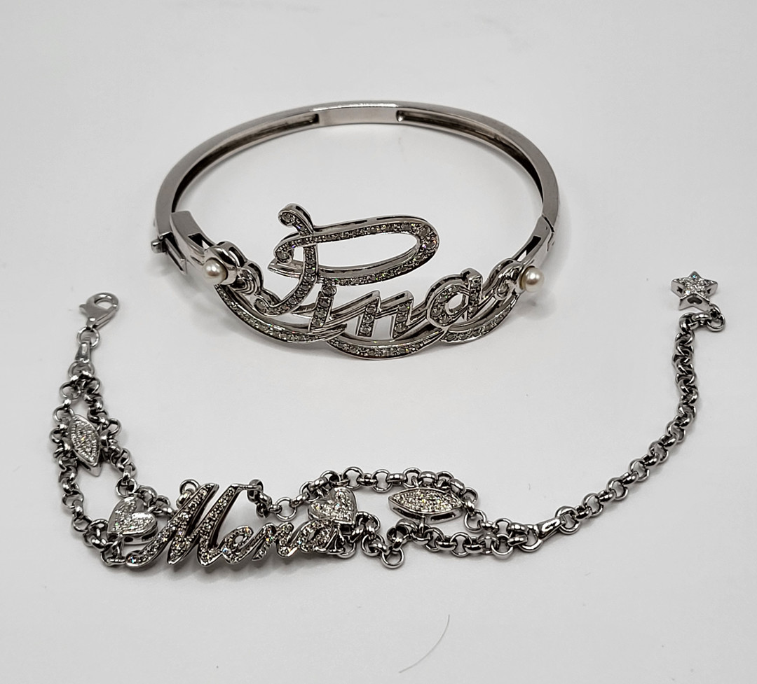 Due bracciali oro diamantini perle