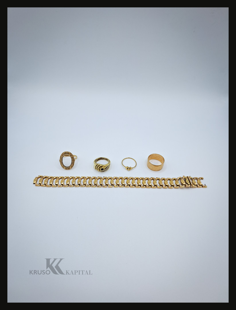 Braccialetto quattro anelli oro pietre