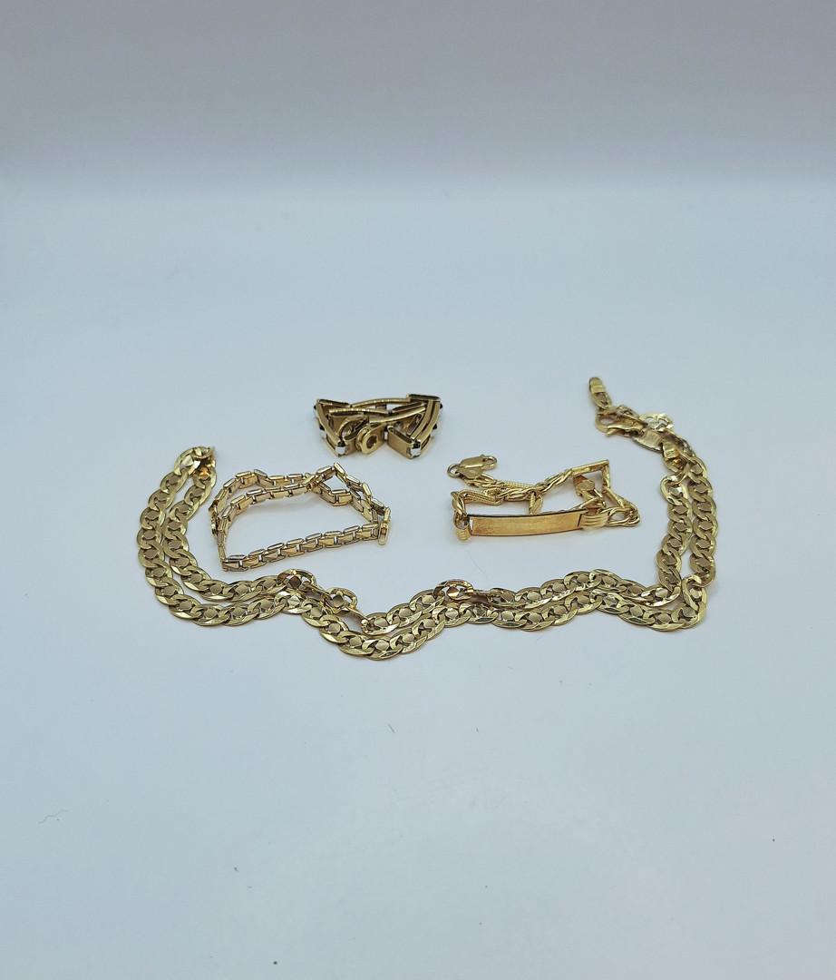 Collana e tre bracciali oro