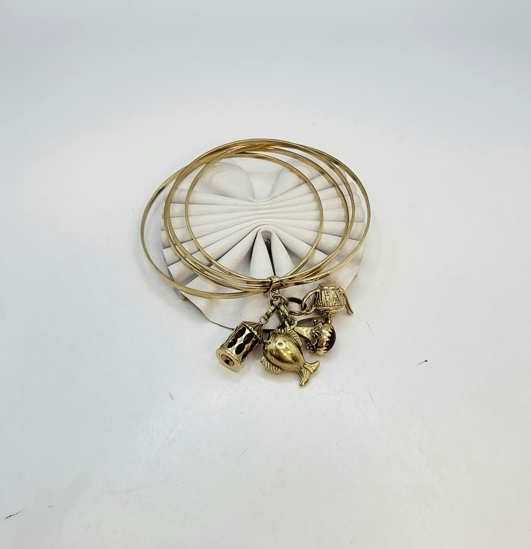 Bracciale con ciondoli oro pietre
