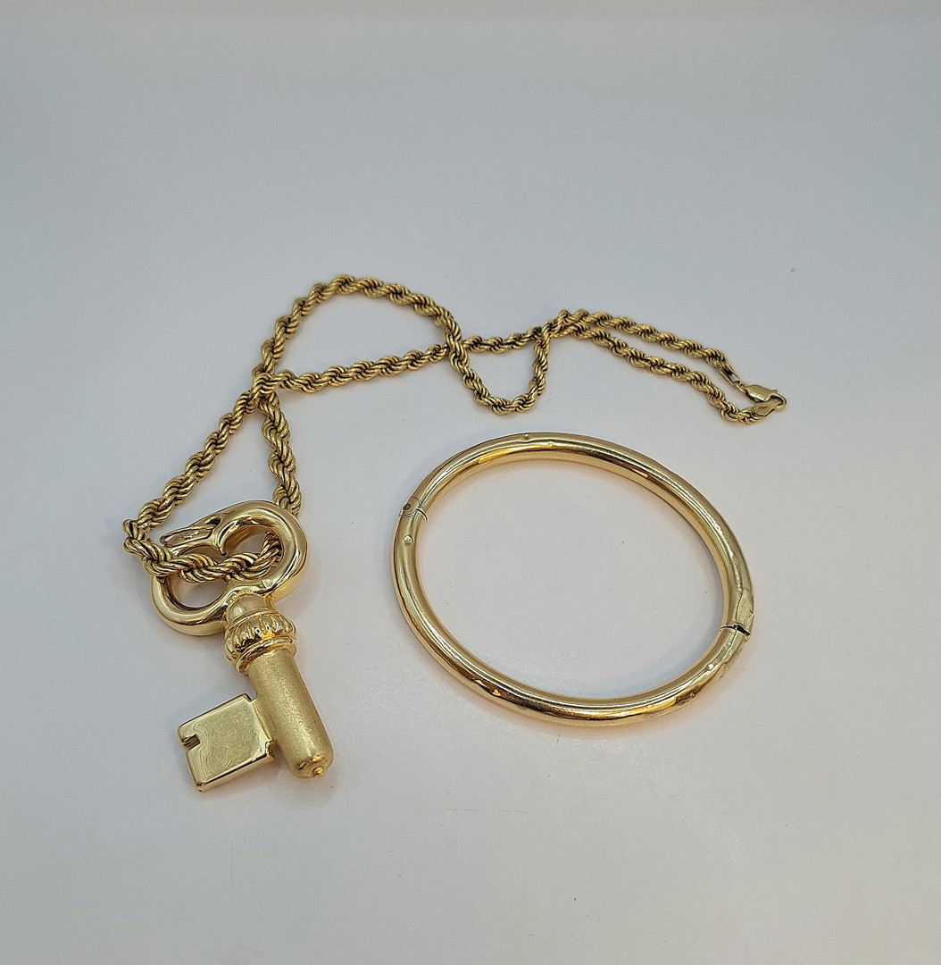 Collana bracciale e ciondolo oro