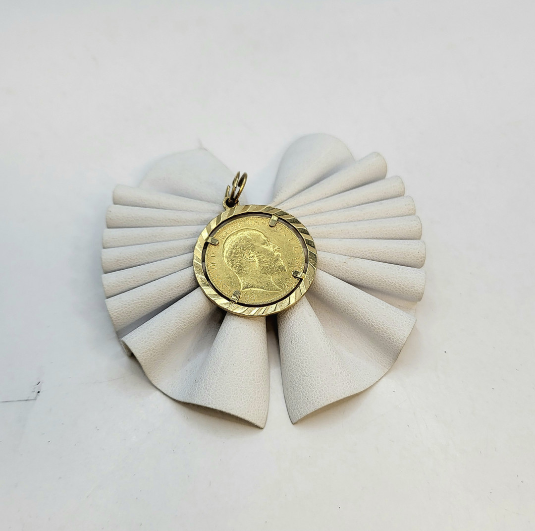 Ciondolo con moneta oro