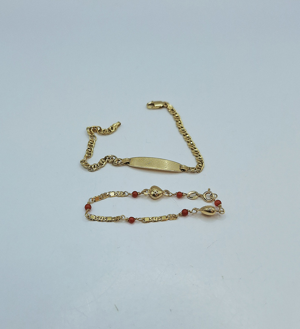 Due bracciai oro pietre