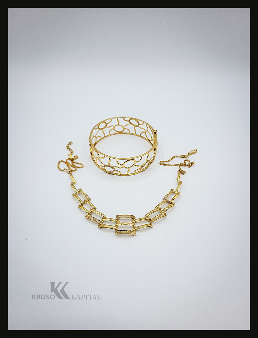 Collana e bracciale oro pietre 