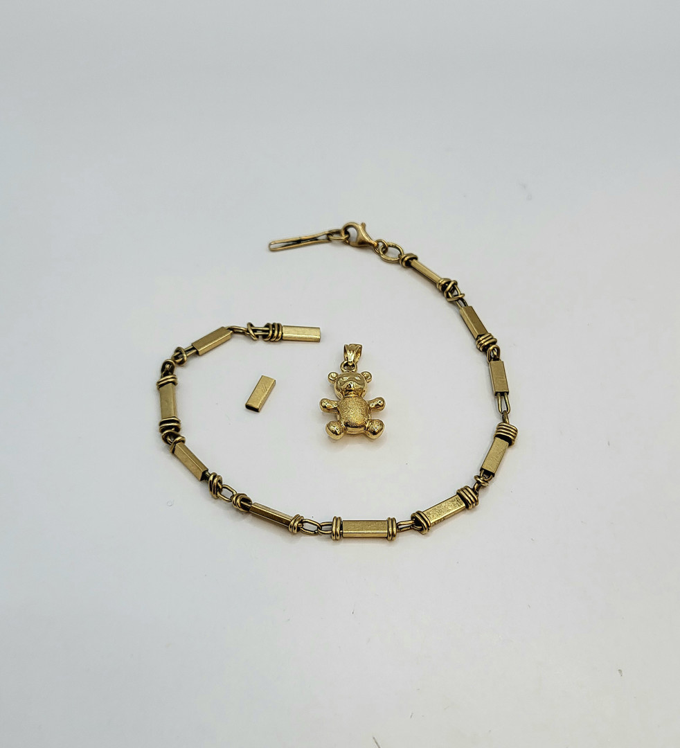 Bracciale e ciondolo oro