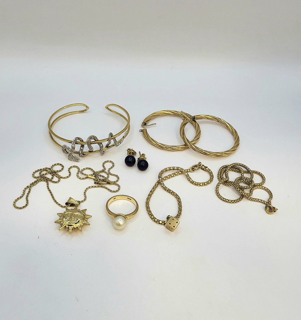 Oggetti in oro diamantini pietre perla coltivata