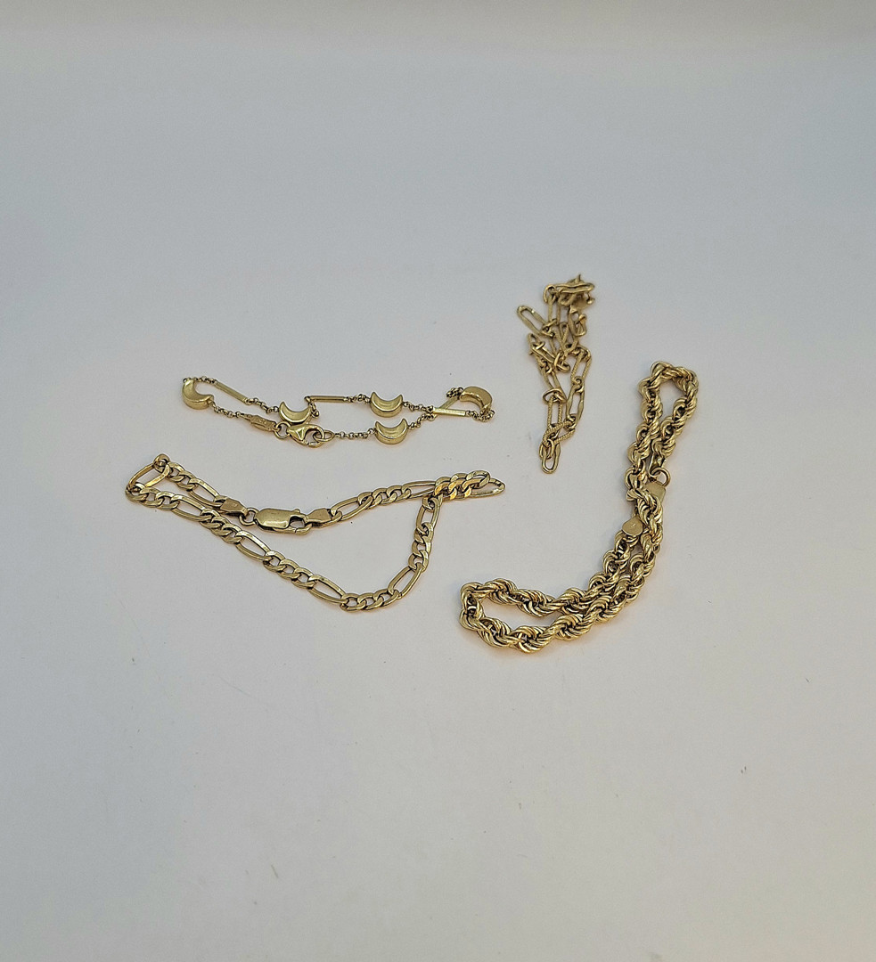 Quattro bracciali oro