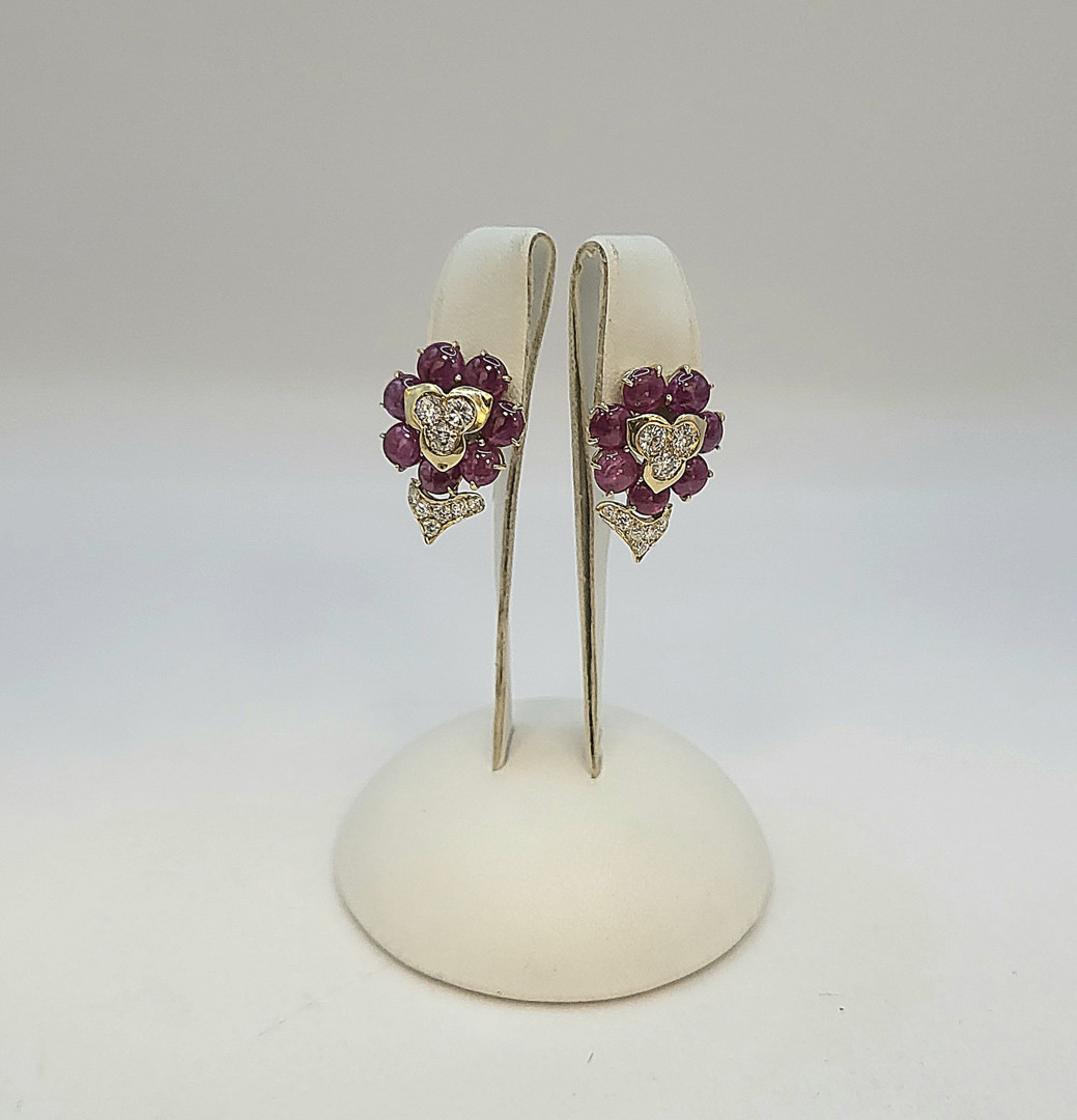 Paio orecchini oro diamanti rubini