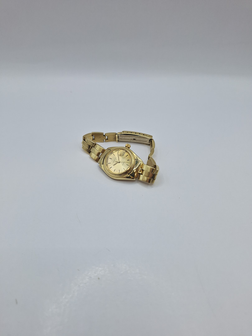 Orologio con bracciale oro