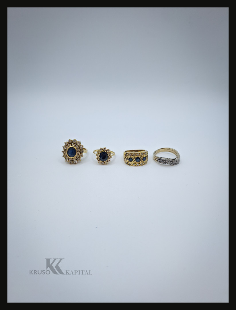 Quattro anelli oro pietre diamanti