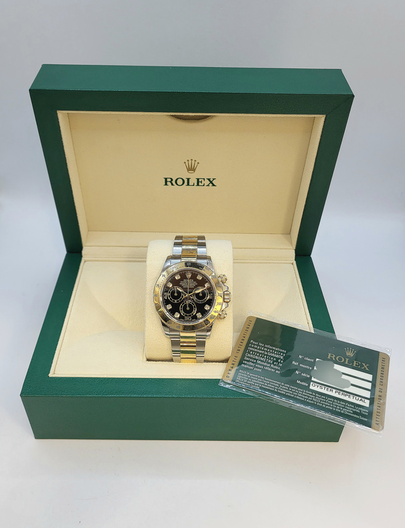 Cronografo acciaio e oro indici con diamantini Rolex Daytona, scatola e garanzia a corredo