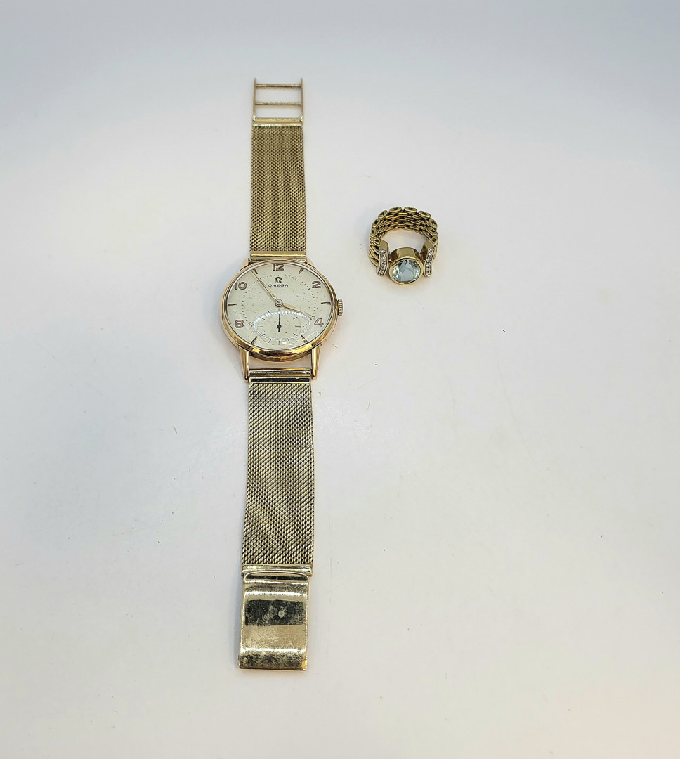 Orologio Omega oro e anello oro diamanti pietra