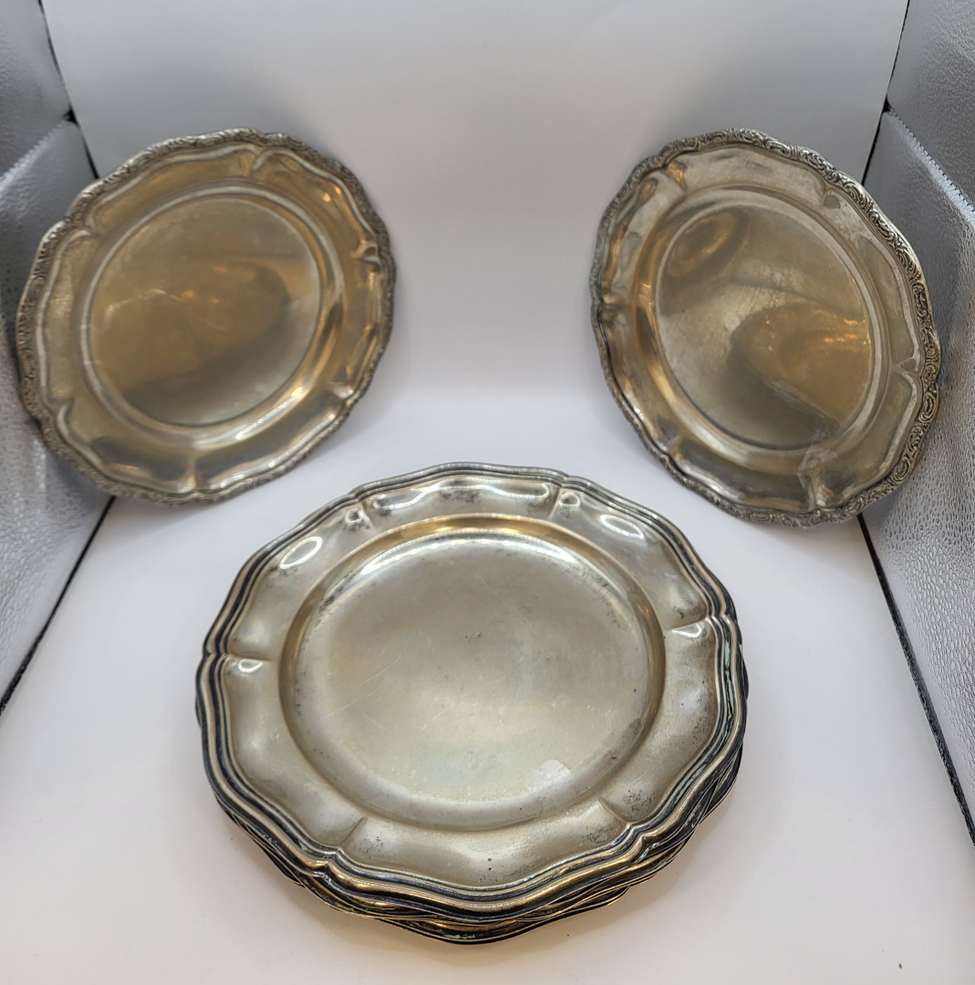 Otto piattini argento